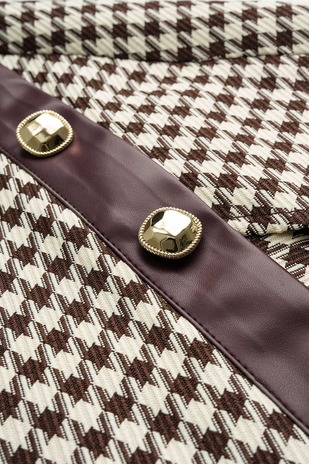 Asymetrická sukně z umělé kůže s potiskem houndstooth a bočním střihem